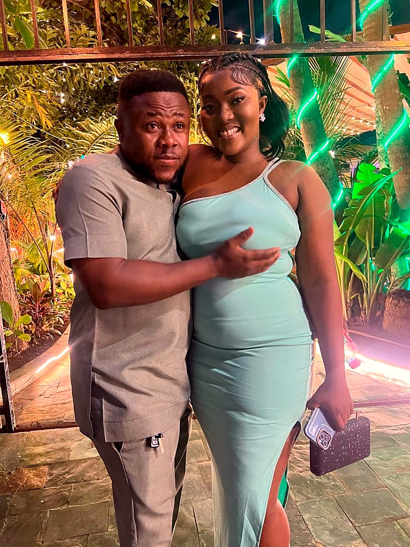 Eddy holding Kessewa close on an evening out